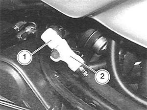 The OE plastic fuel quick disconnect, showing the two parts